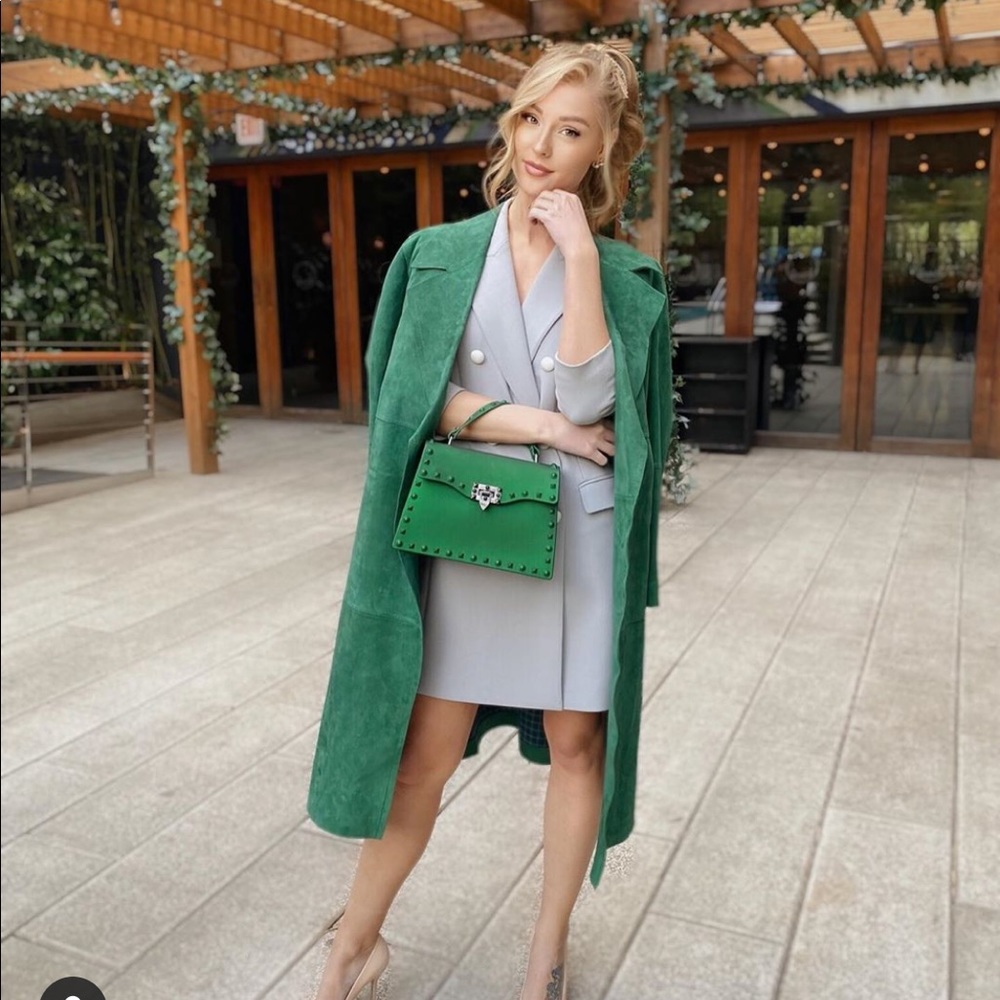 Green studded bag with long strap included